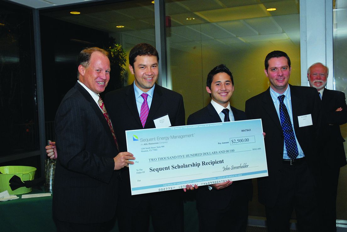 Left to right, Sequent Energy President Doug Schantz, Max Correa, Damion Mathis, and Sequent HR Director Ben Abramson