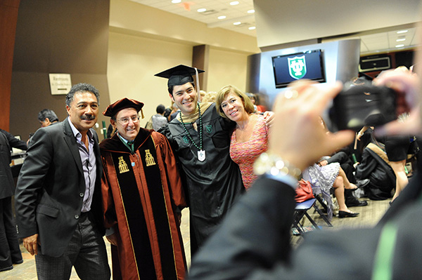 Dean Solomon with a new graduate