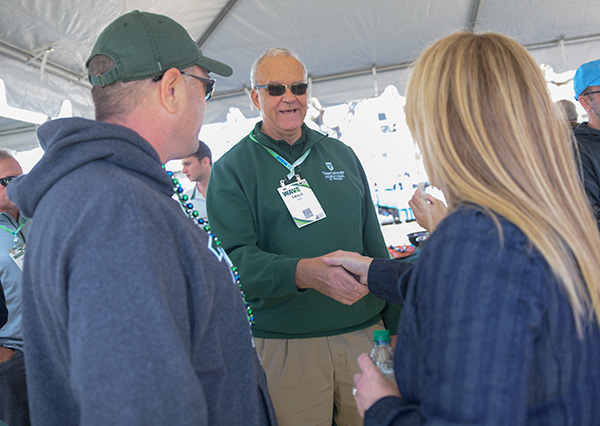Goes with guests at Tulane homecoming